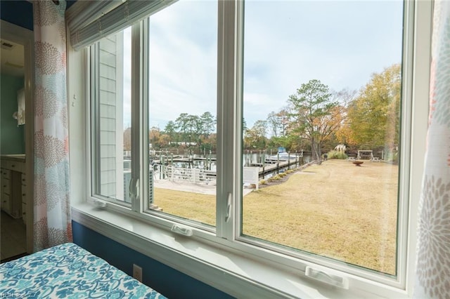 doorway to outside featuring plenty of natural light and a water view