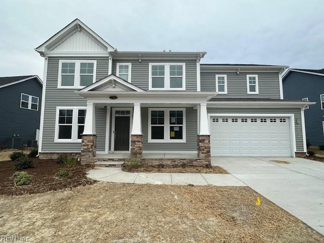 craftsman inspired home with a garage