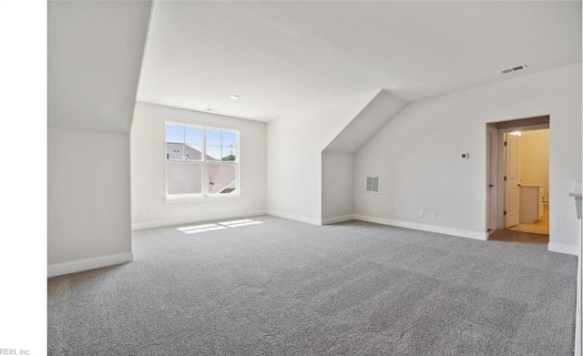 bonus room with carpet