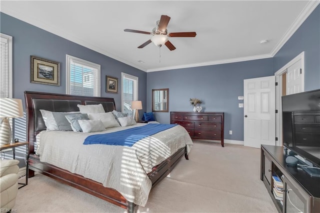 bedroom with ceiling fan, crown molding, and light carpet