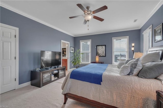 bedroom with carpet flooring, ceiling fan, and crown molding