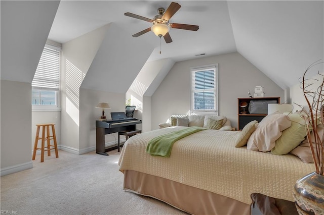 carpeted bedroom featuring ceiling fan and lofted ceiling