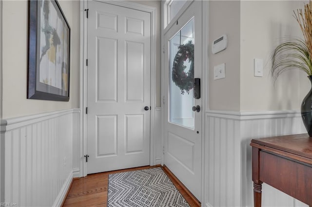 doorway with light hardwood / wood-style floors