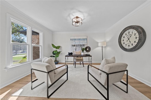 interior space featuring a chandelier, ornamental molding, and light hardwood / wood-style flooring