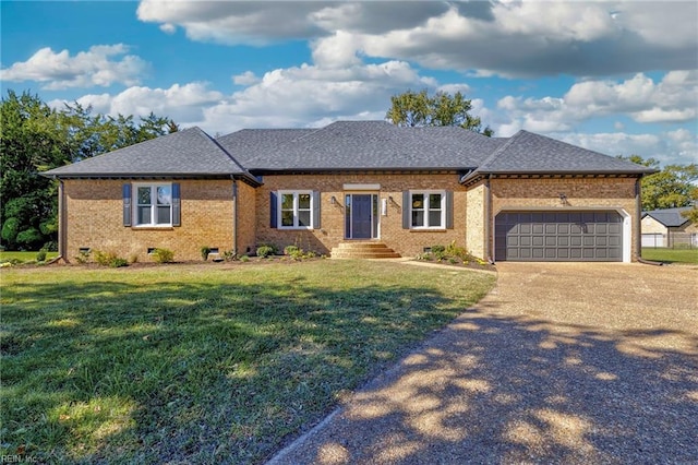 single story home featuring a front yard and a garage