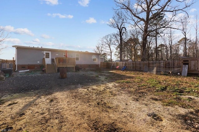 view of yard with a wooden deck