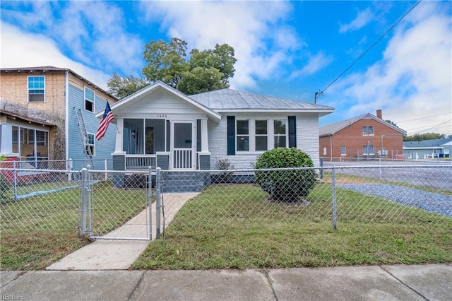 bungalow with a front yard