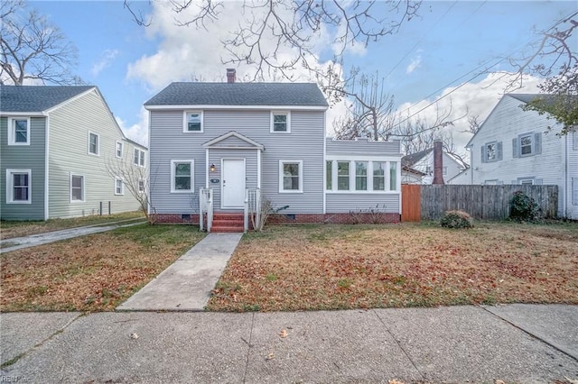 view of front of house with a front lawn