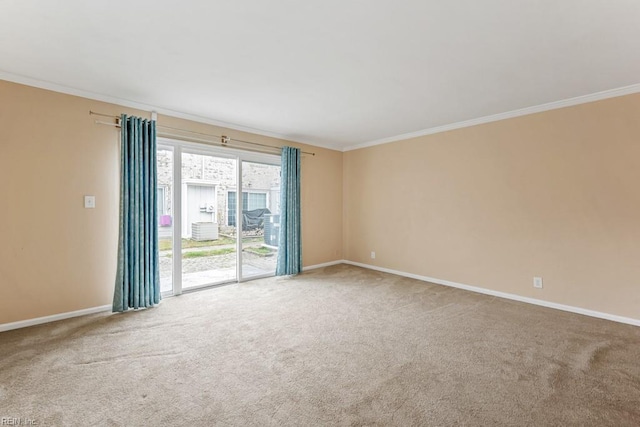 carpeted empty room with ornamental molding