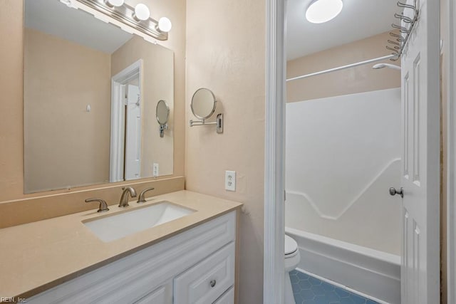 full bathroom featuring shower / tub combination, tile patterned flooring, vanity, and toilet