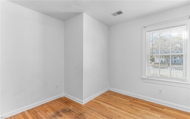 empty room with light wood-type flooring