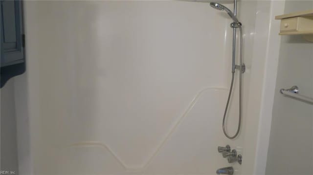 details with shower / bath combination