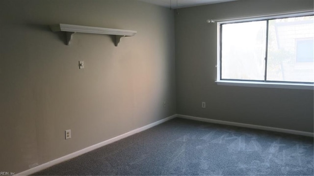 unfurnished room with carpet floors