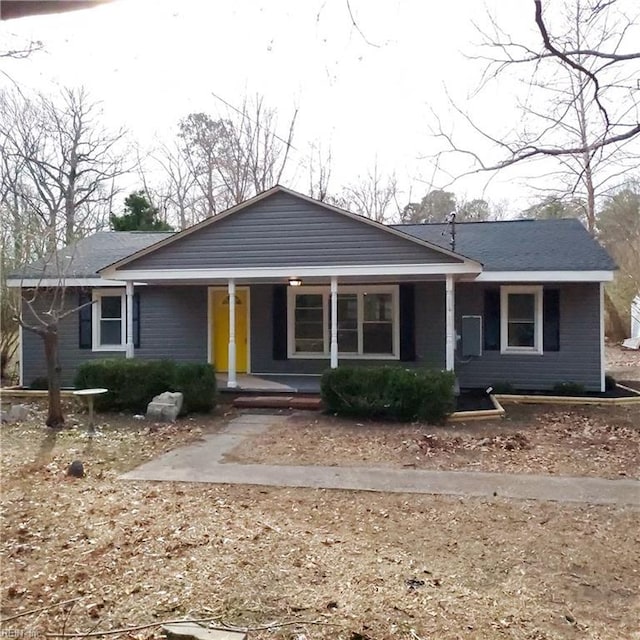 ranch-style home with a porch