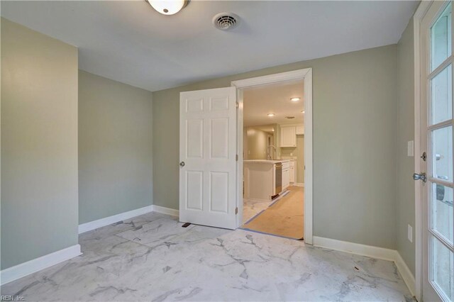 1013 Dare Rd, Yorktown, VA 23692 - unfurnished room featuring baseboards and a sink