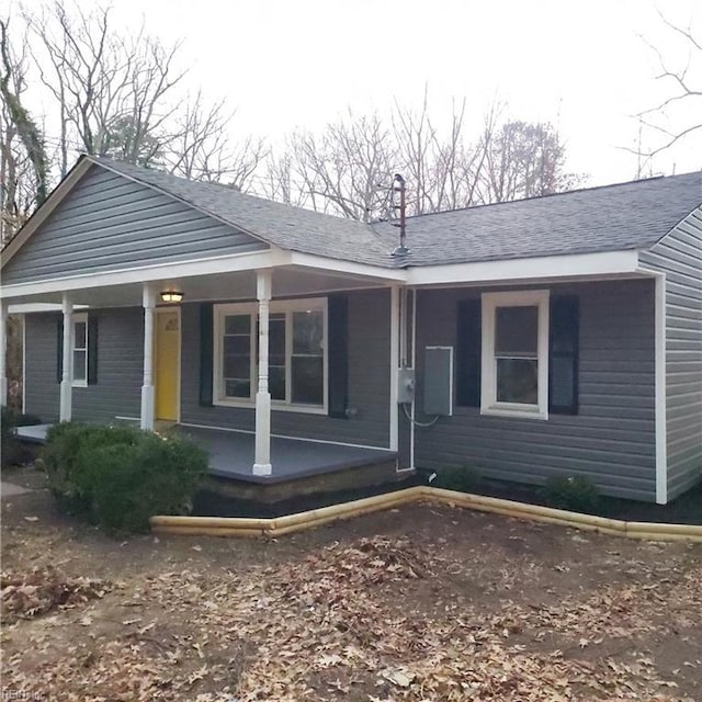 single story home featuring a porch