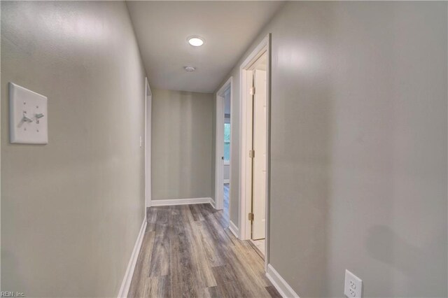 1013 Dare Rd, Yorktown, VA 23692 - corridor featuring wood finished floors and baseboards