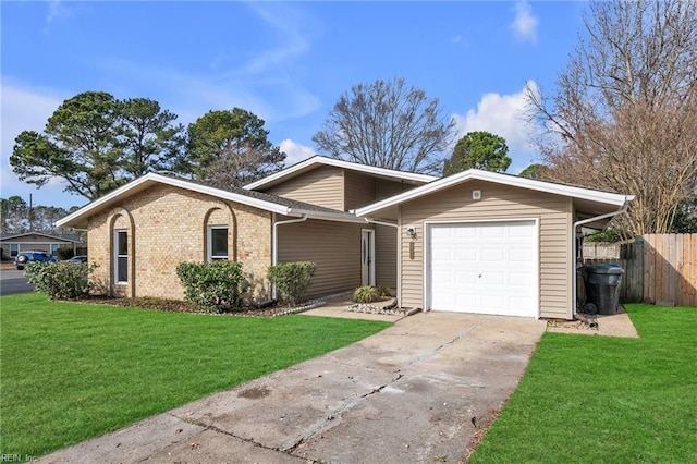 ranch-style home featuring a front lawn and a garage