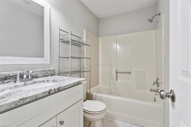 full bathroom featuring tile patterned floors, shower / bathing tub combination, vanity, and toilet