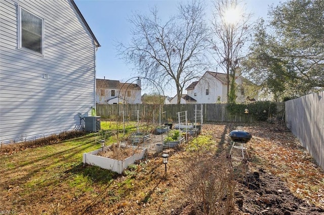 view of yard featuring central AC unit