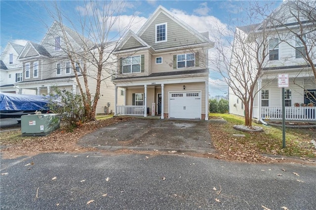 townhome / multi-family property featuring a porch and a garage