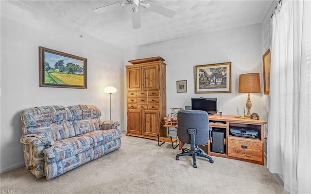 carpeted office with ceiling fan