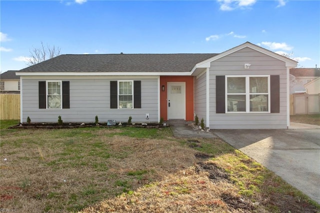 ranch-style house with a front yard