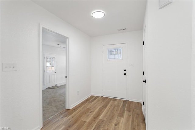 foyer entrance featuring light wood-type flooring