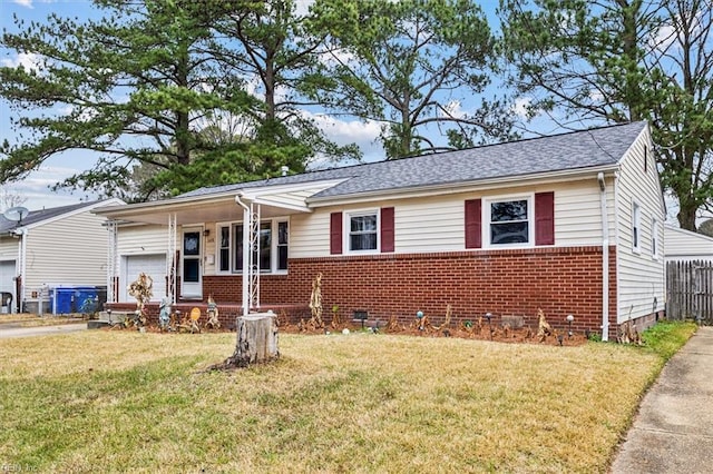 view of front of house featuring a front lawn and covered porch