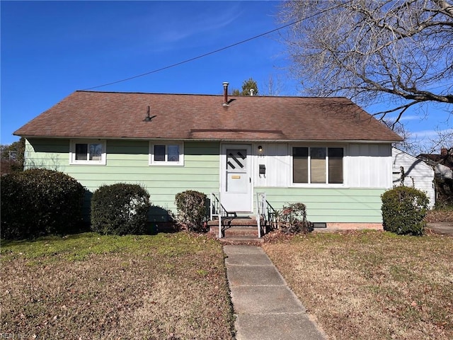 view of front of home with a front yard