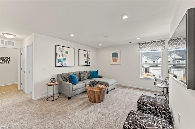 living room with light colored carpet