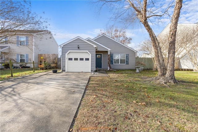 view of front facade featuring a front yard and a garage