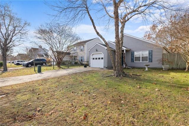 view of front of home featuring a front lawn and a garage