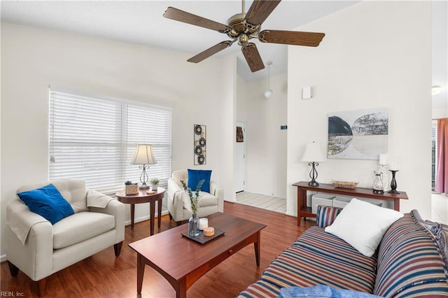 living room featuring hardwood / wood-style flooring and ceiling fan