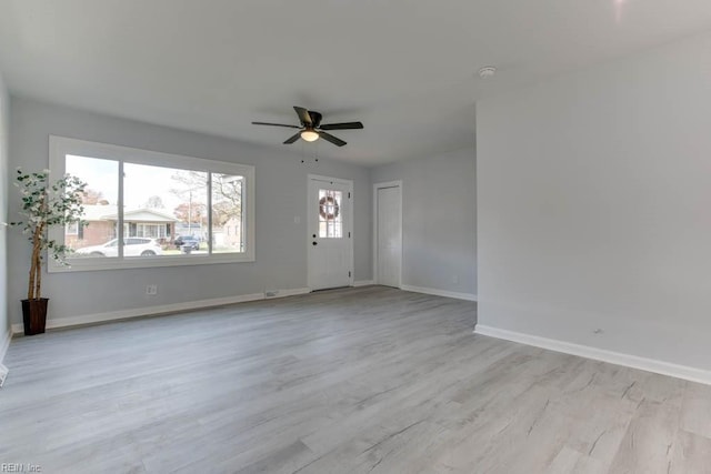 interior space featuring light hardwood / wood-style floors and ceiling fan