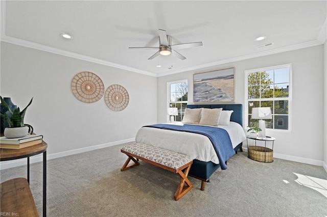 bedroom with carpet flooring, ceiling fan, and crown molding