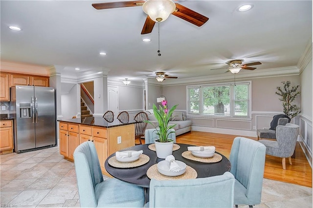 dining area with crown molding