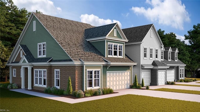 view of front of house featuring a garage and a front yard