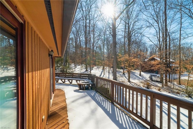 view of snow covered deck