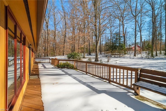 view of snow covered deck