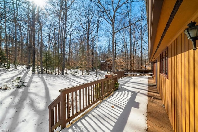 view of snow covered deck