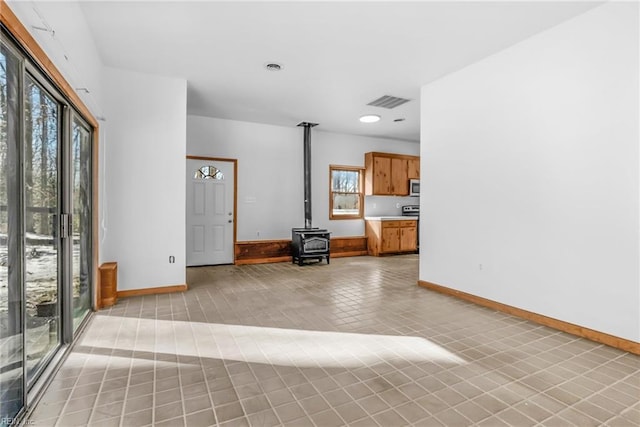 interior space featuring a wood stove