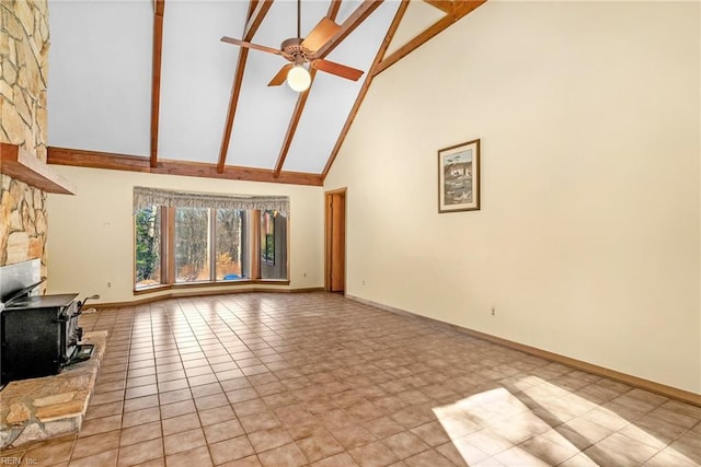 unfurnished living room with light tile patterned flooring, beamed ceiling, a wood stove, and high vaulted ceiling