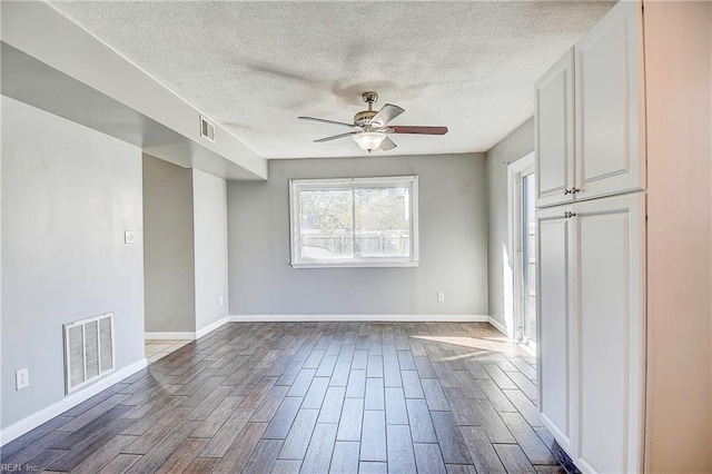 unfurnished room featuring ceiling fan