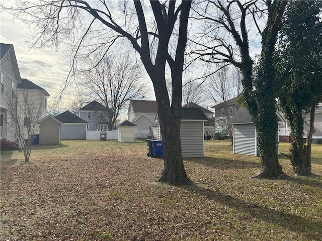 view of yard with a storage unit