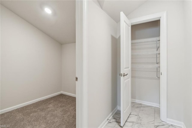 interior space featuring vaulted ceiling