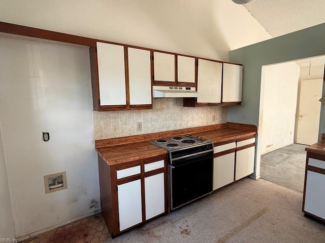 kitchen featuring wooden counters, tasteful backsplash, vaulted ceiling, electric range, and white cabinetry