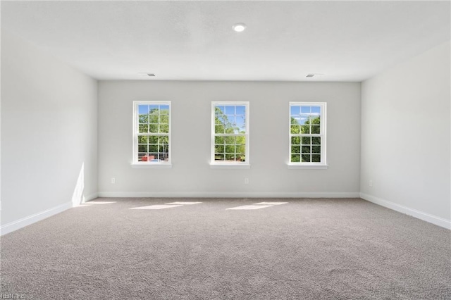 1232 Treviso Bay, Williamsburg, VA 23188 - spare room featuring baseboards, visible vents, and carpet floors