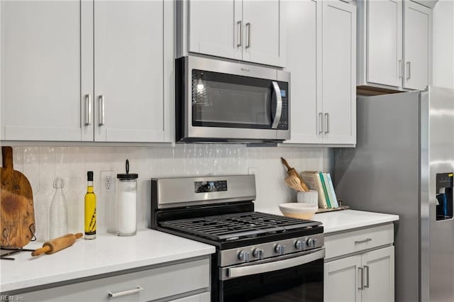 1232 Treviso Bay, Williamsburg, VA 23188 - kitchen featuring light countertops, stainless steel appliances, and tasteful backsplash