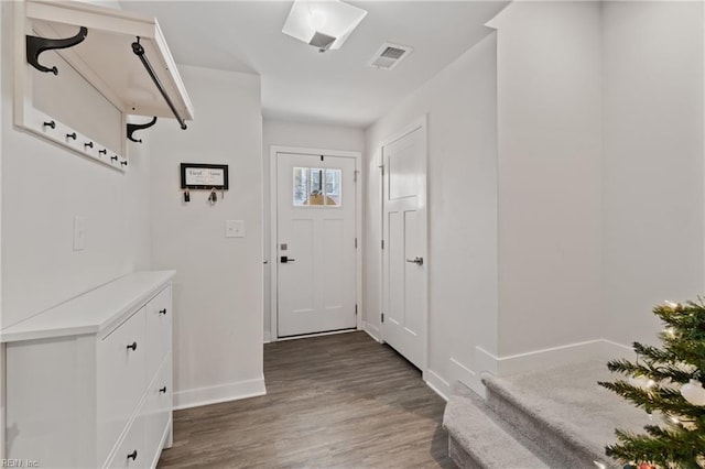 doorway to outside featuring dark hardwood / wood-style floors